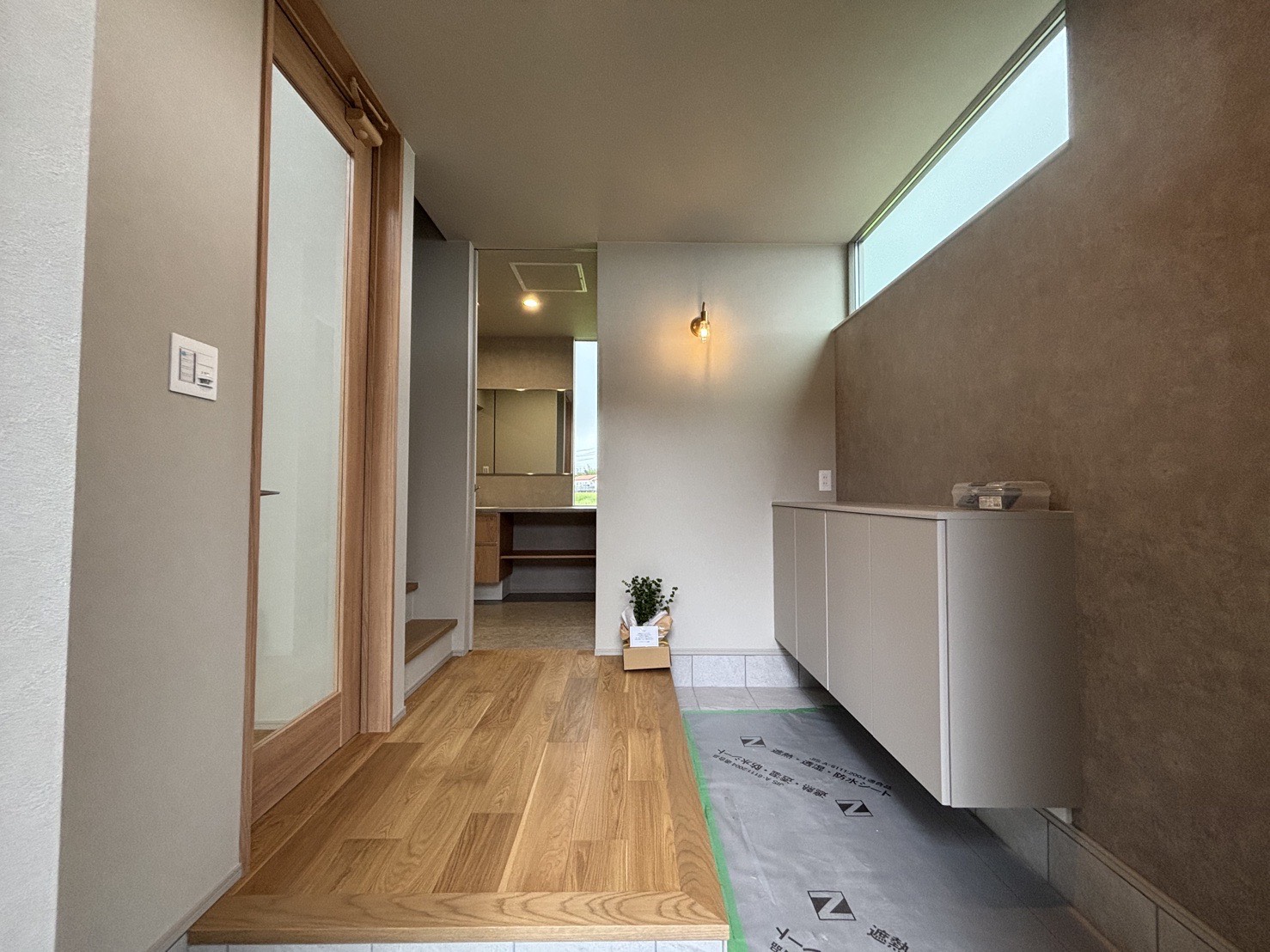 三重で注文住宅ならアイデザインホーム|引渡の現場リポート|L字型の奥行きのある玄関